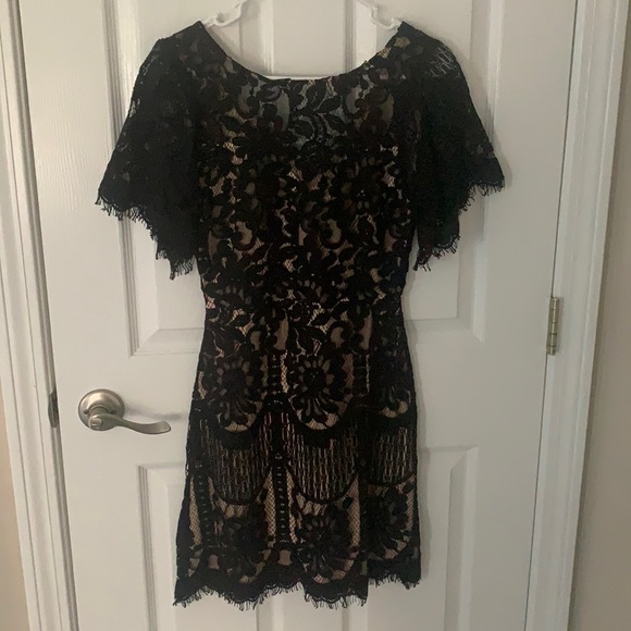 Black lace dress with tan underneath Clearance